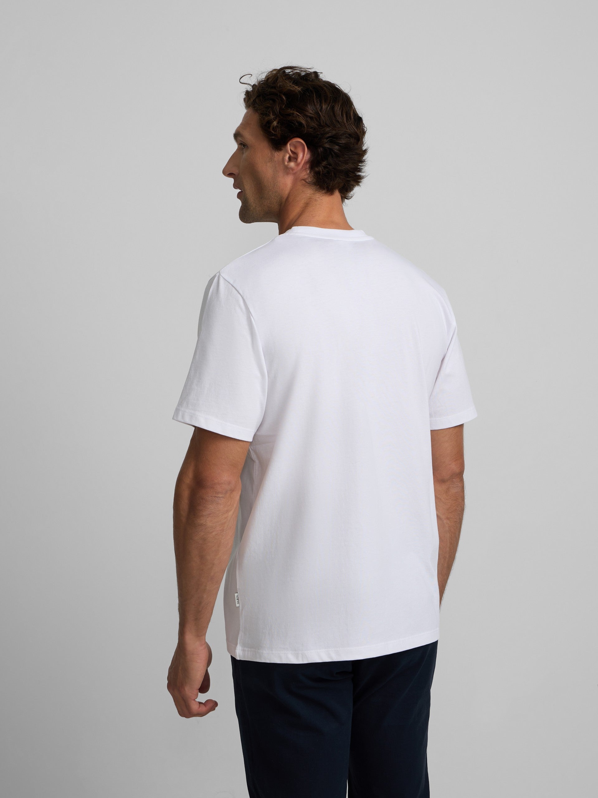 Camiseta lisa minilogo parche blanca