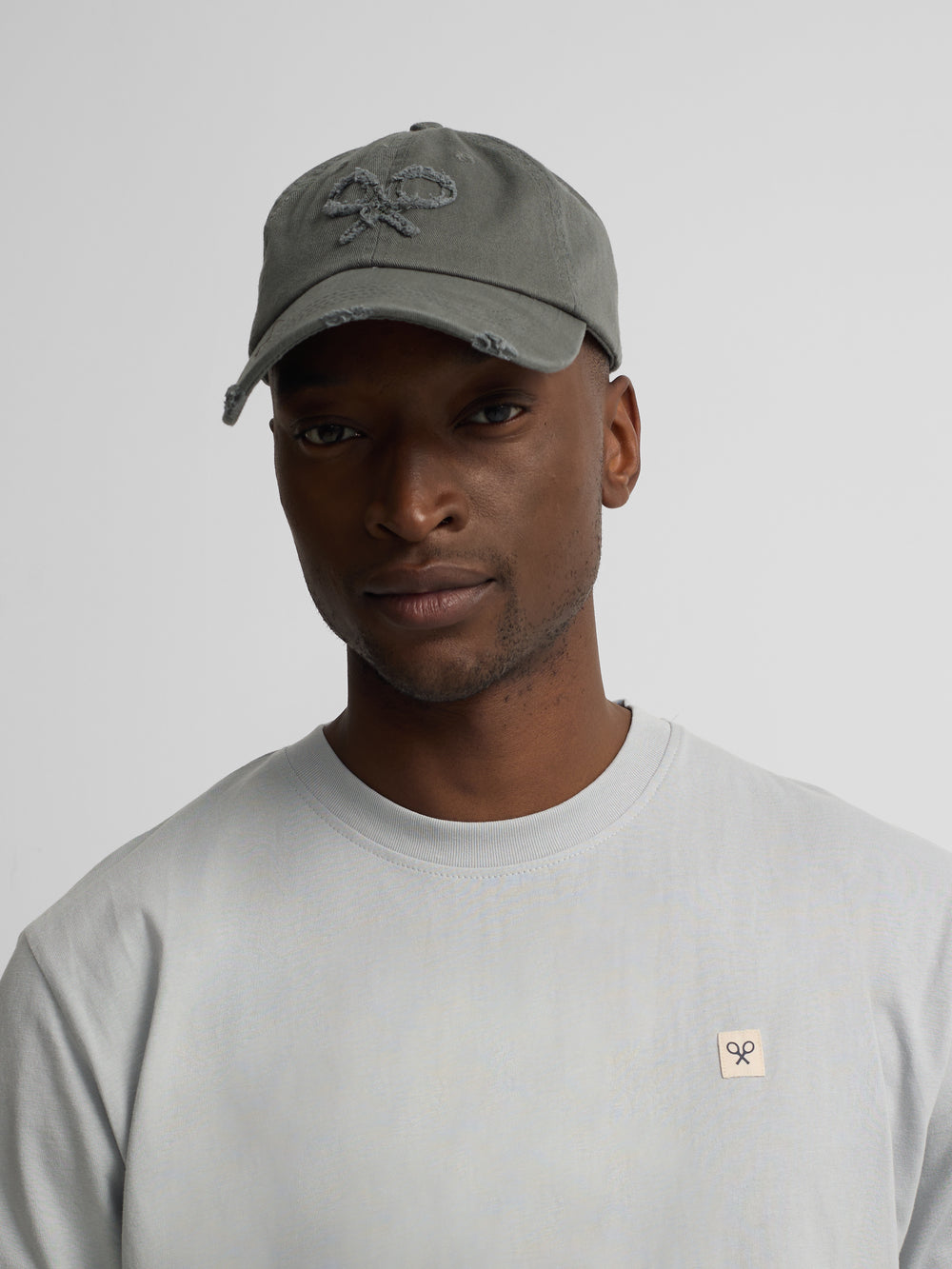 T-shirt lisa minilogo emblema azul claro