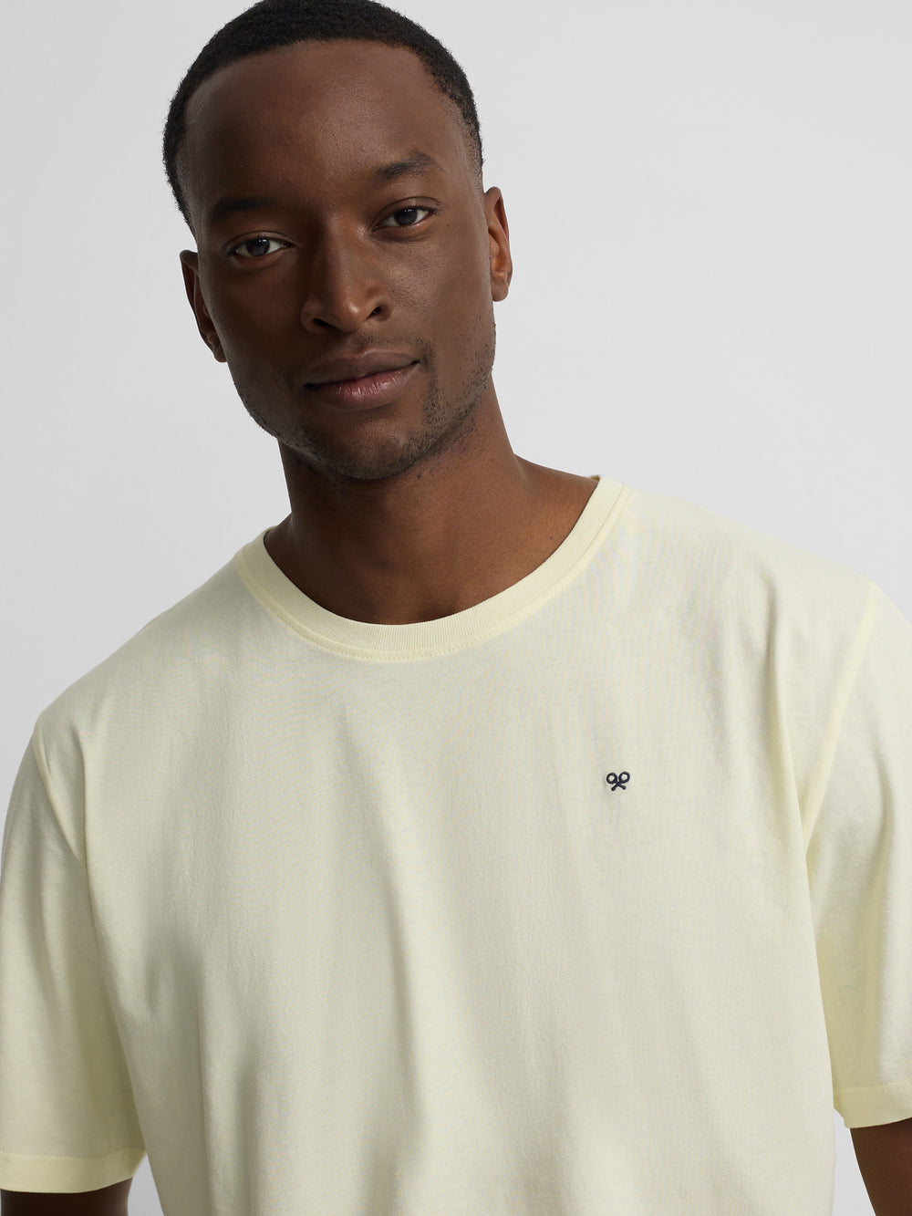 Camiseta minilogo amarillo