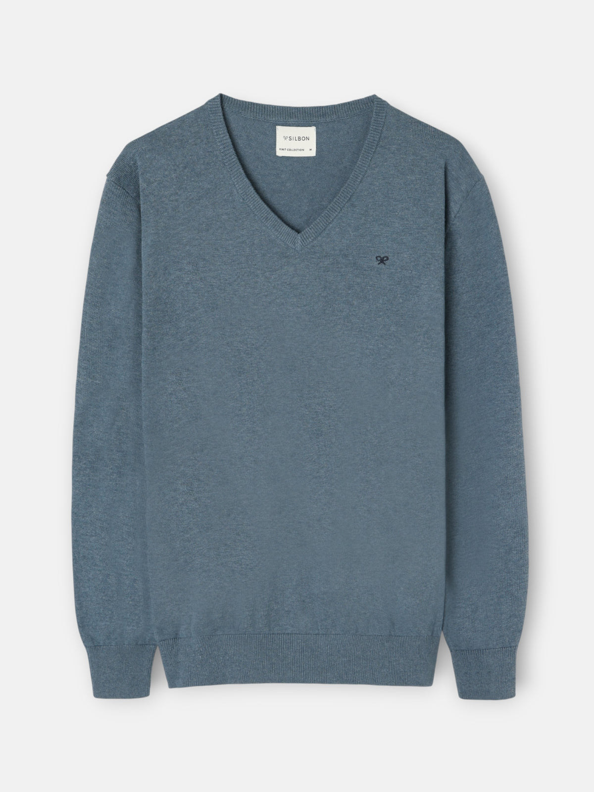 Jersey liso cuello pico azul claro