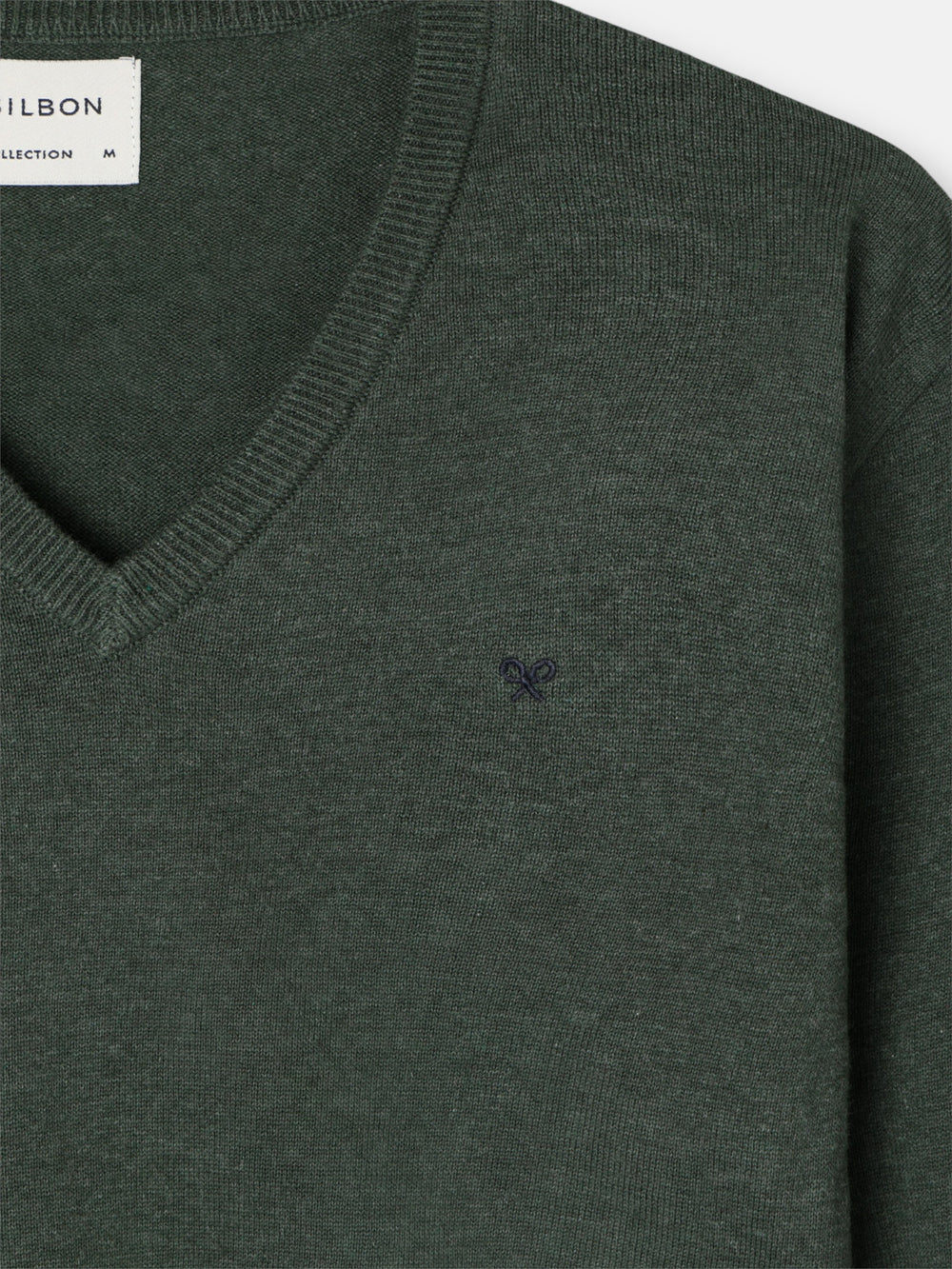 Jersey liso cuello pico verde oscuro