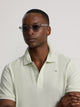 Classic plain light green polo