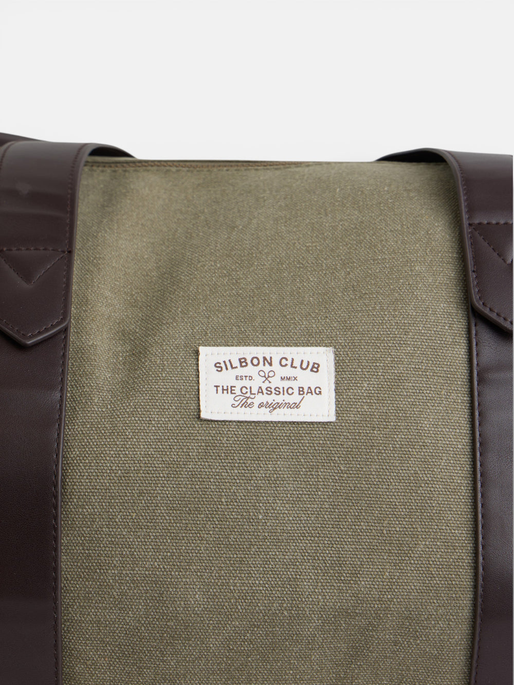 Mala de viagem com detalhe em pele verde