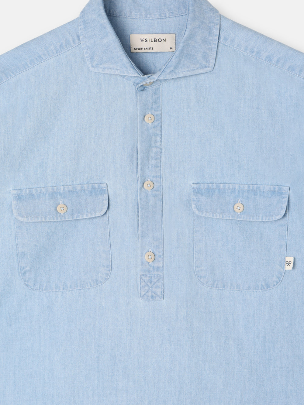 T-shirt de croisière en denim bleu clair avec poches