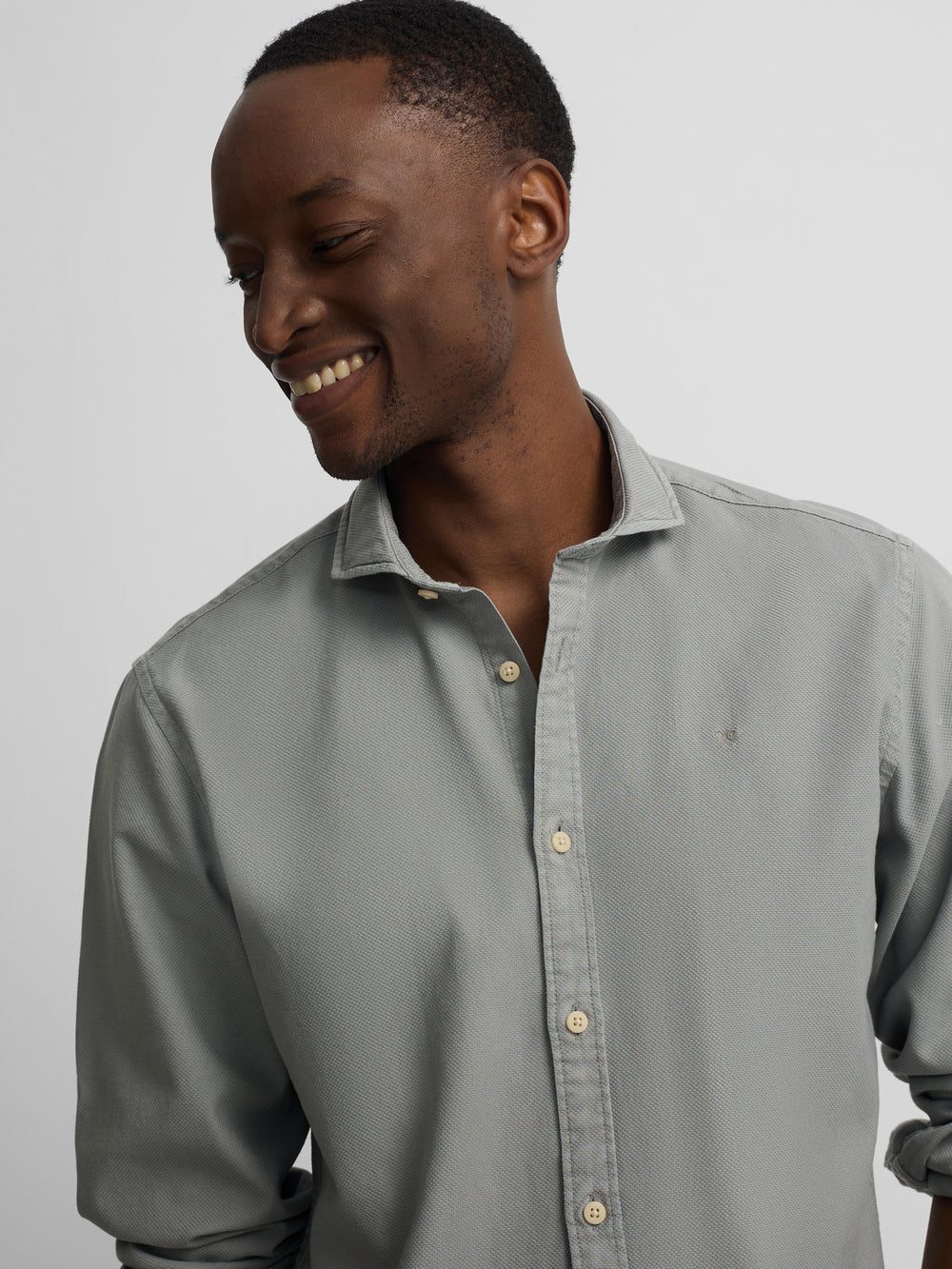 polo de sport vert moyen à logo structuré