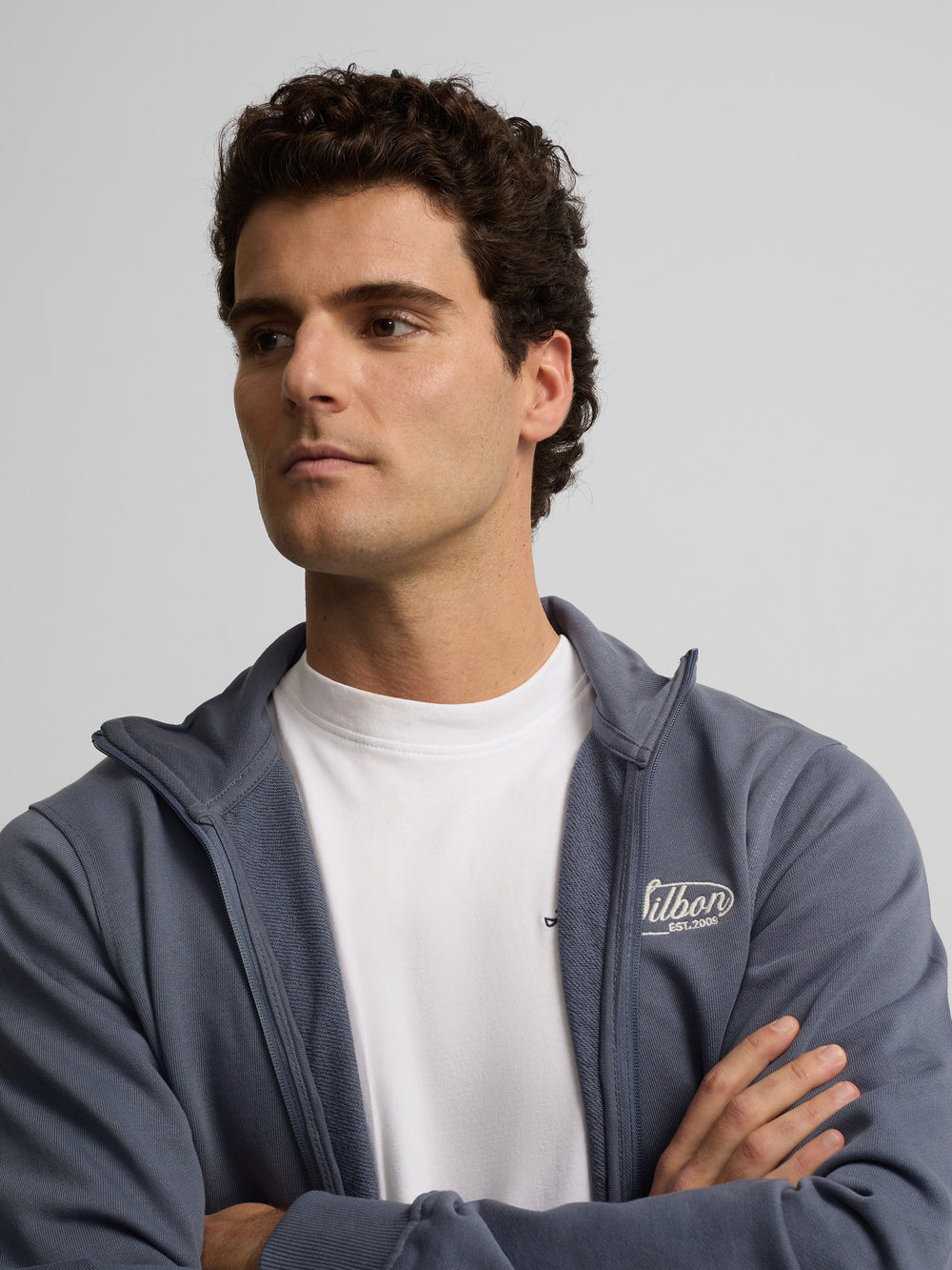 Sudadera cremallera bordado azul indigo