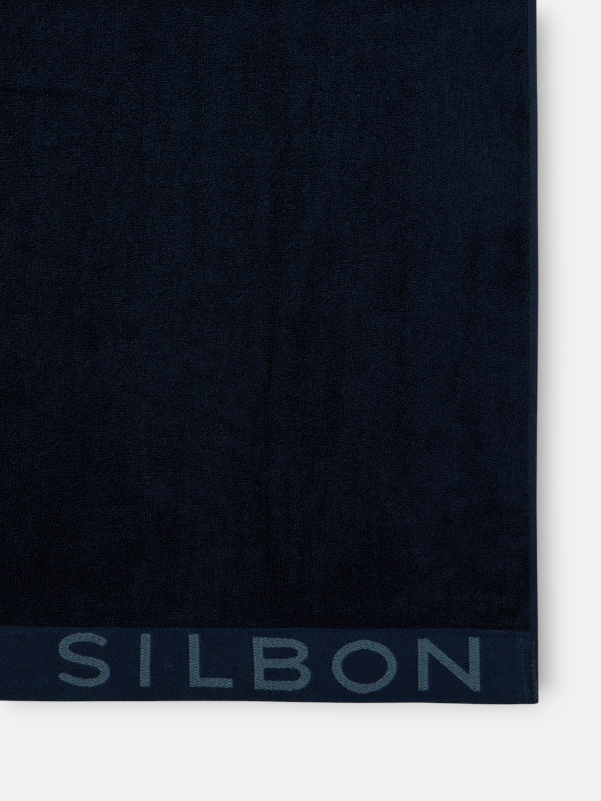 Two-tone navy blue towel