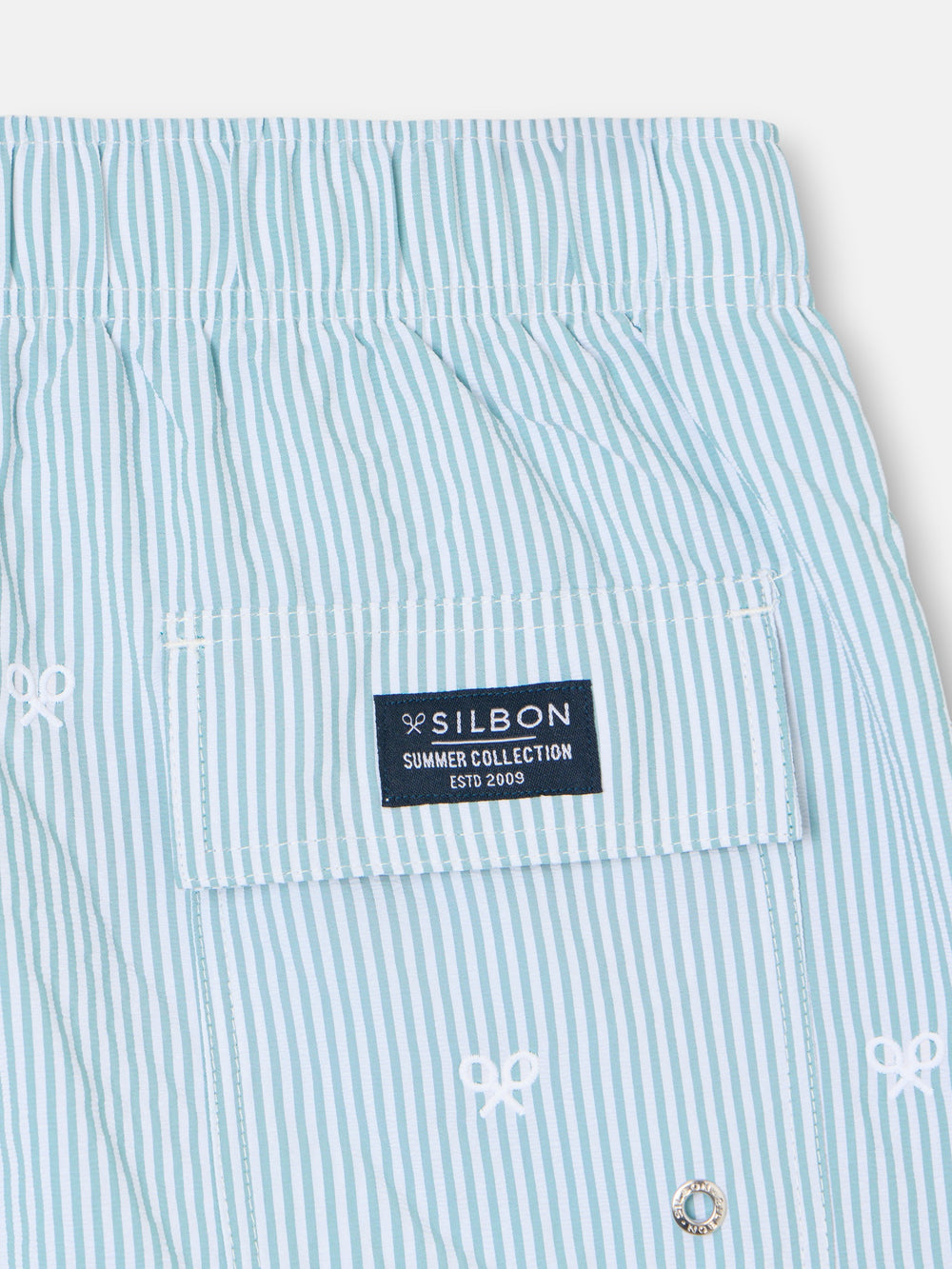 Swimsuit with fine stripes and green logo