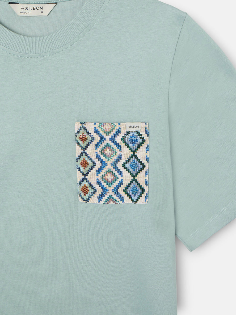 T-shirt vert à poche ethnique