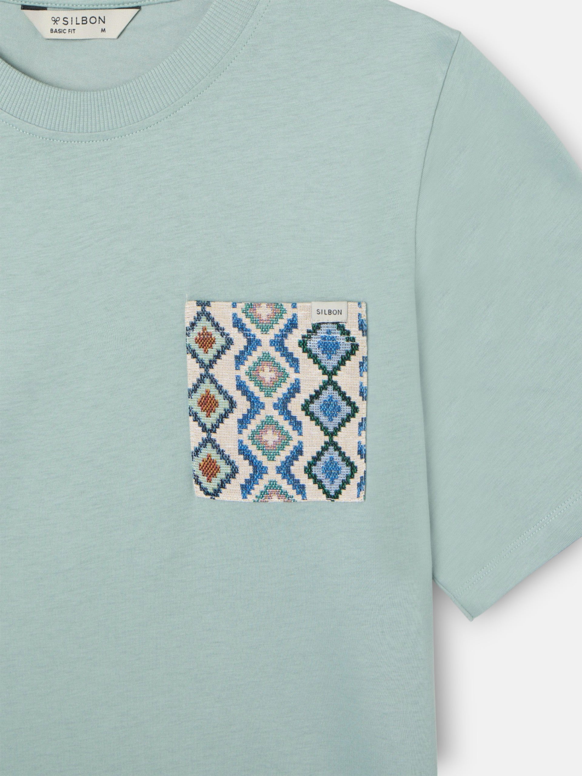 T-shirt vert à poche ethnique