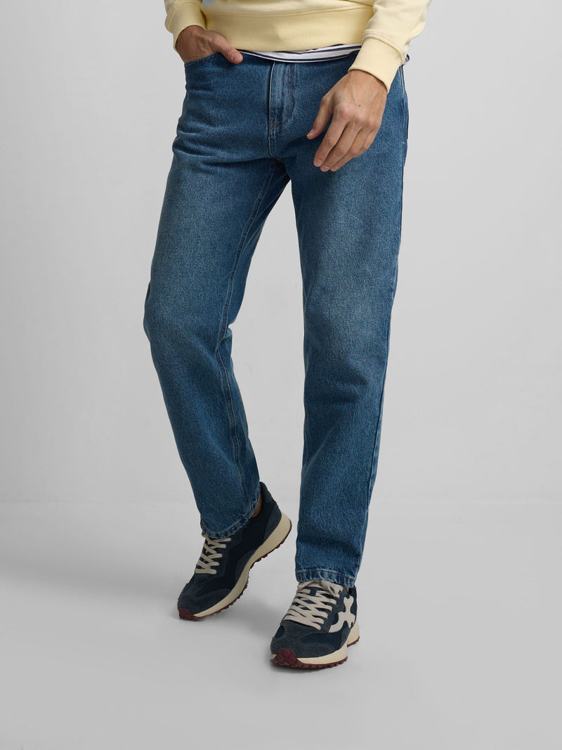 Pantalon de sport en denim bleu foncé coupe fuselée