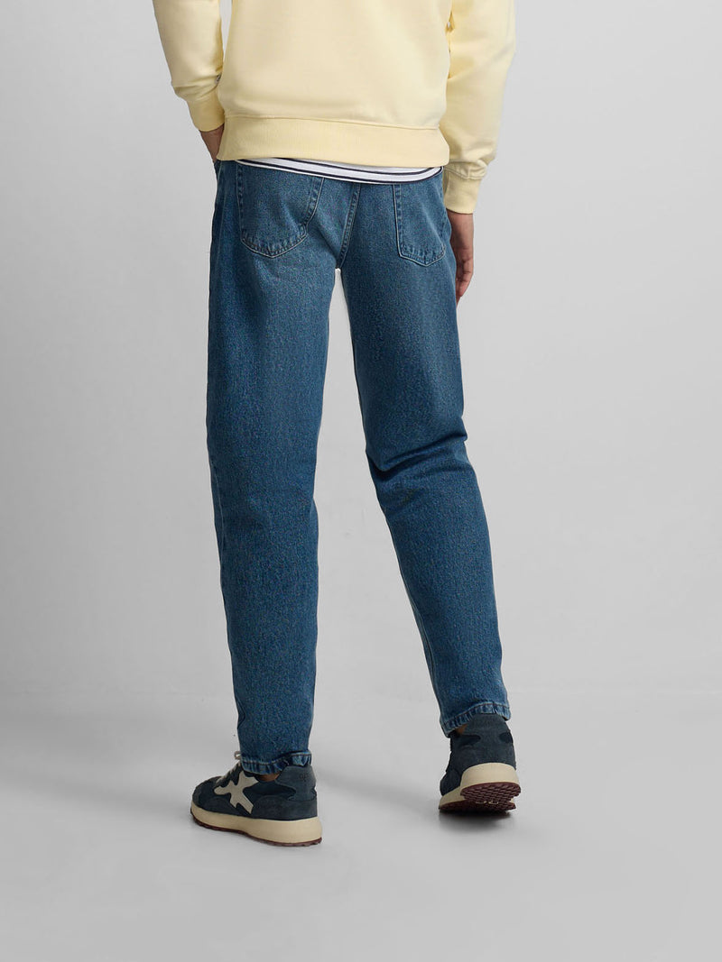 Pantalon de sport en denim bleu foncé coupe fuselée