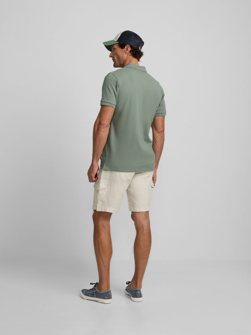 Linen Bermuda shorts with stone pocket