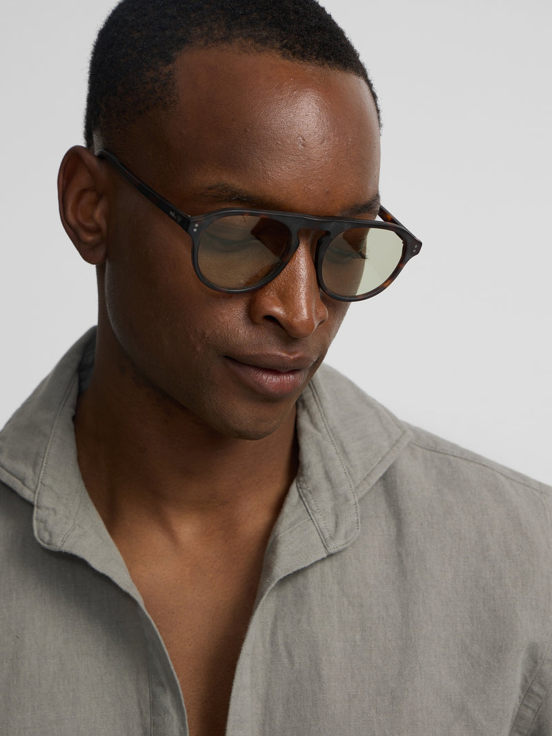 Plain green linen polo