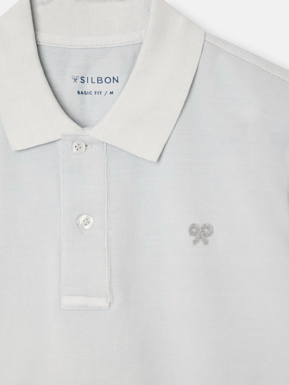 Polo clasico garment dye azul claro