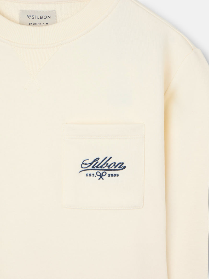 Sudadera bolsillo bordado crema