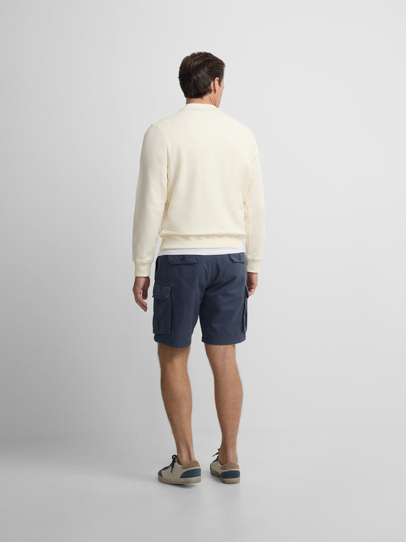 Sudadera bolsillo bordado crema