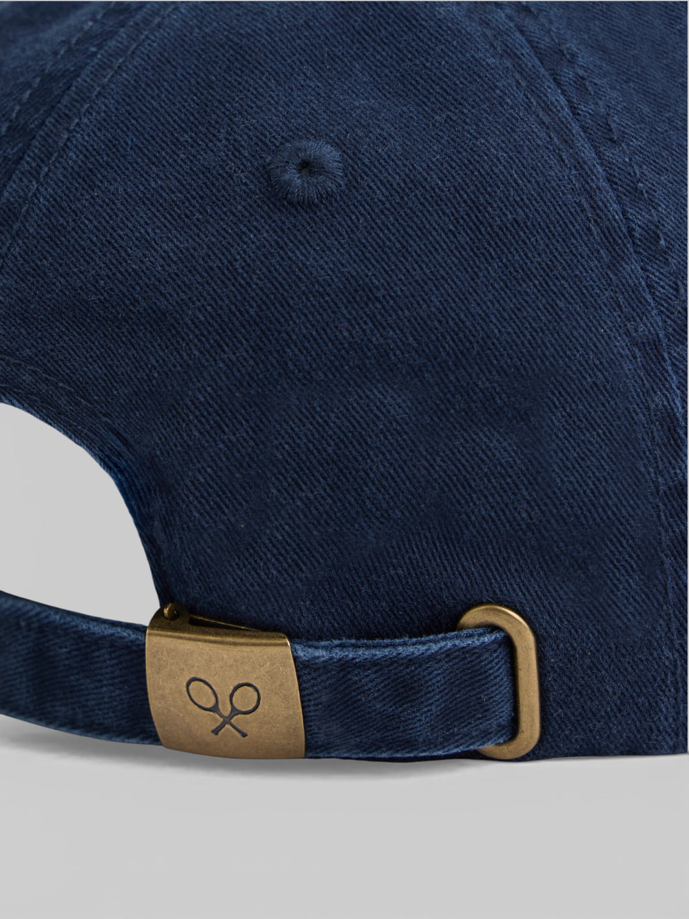 Navy blue embossed racket cap