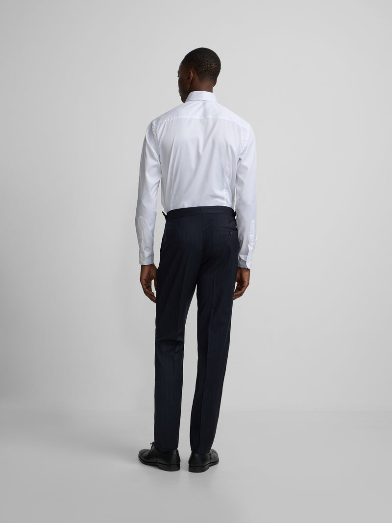Navy blue pinstripe suit trousers