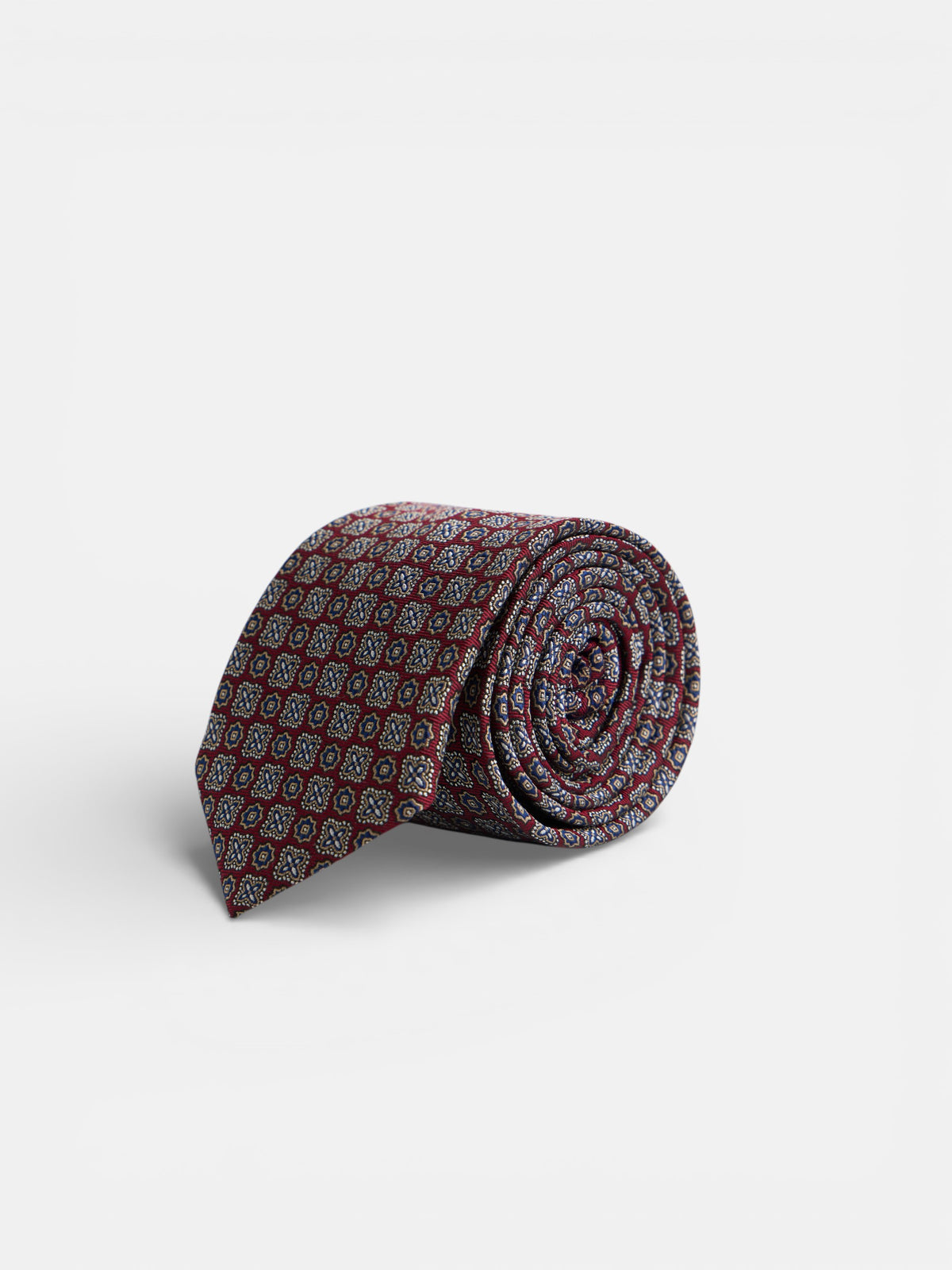 Corbata motivo flor burdeos
