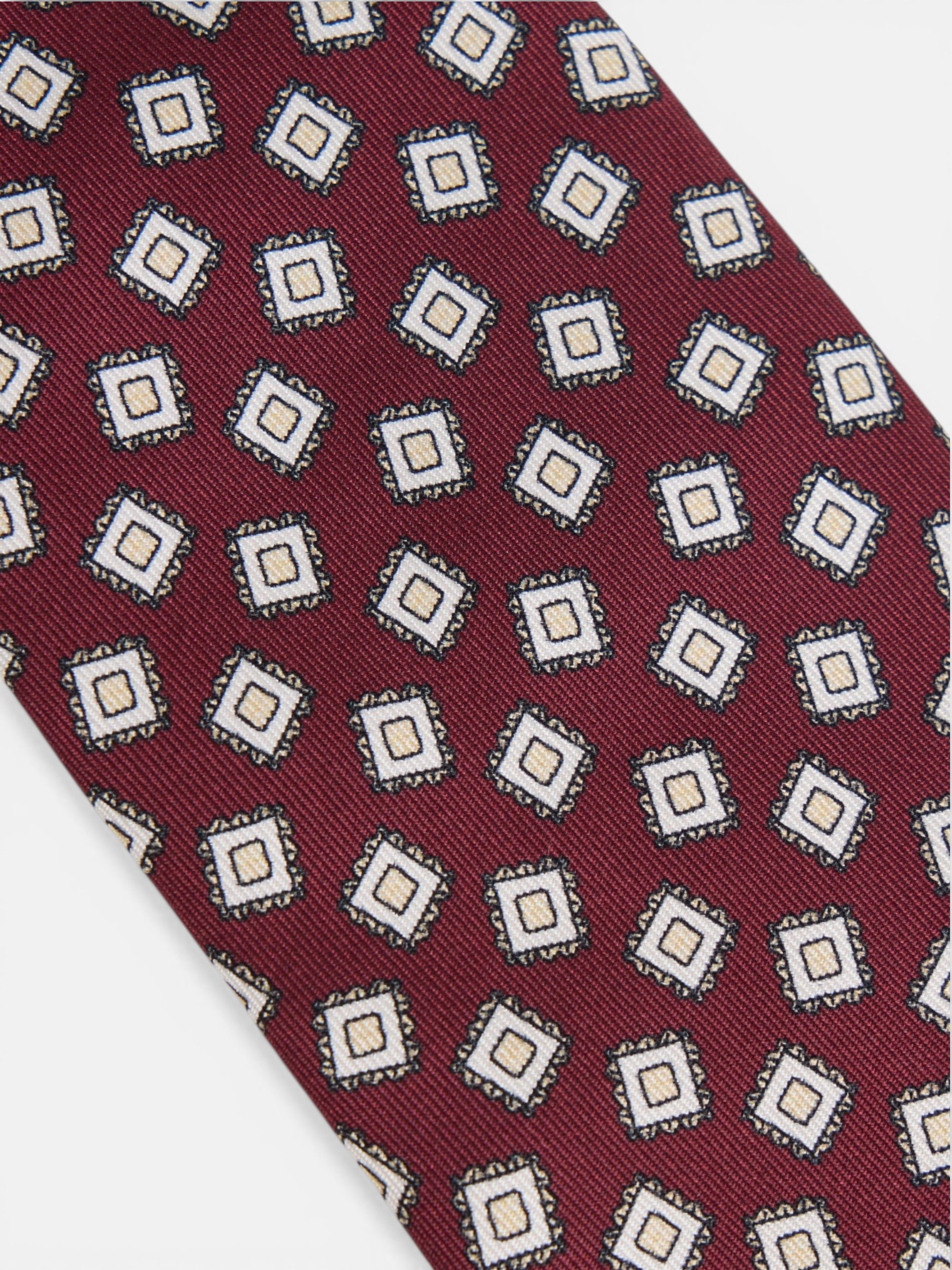 Cravate à motif de carreaux irréguliers bordeaux