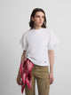 Women's white t-shirt with embroidered ruffles