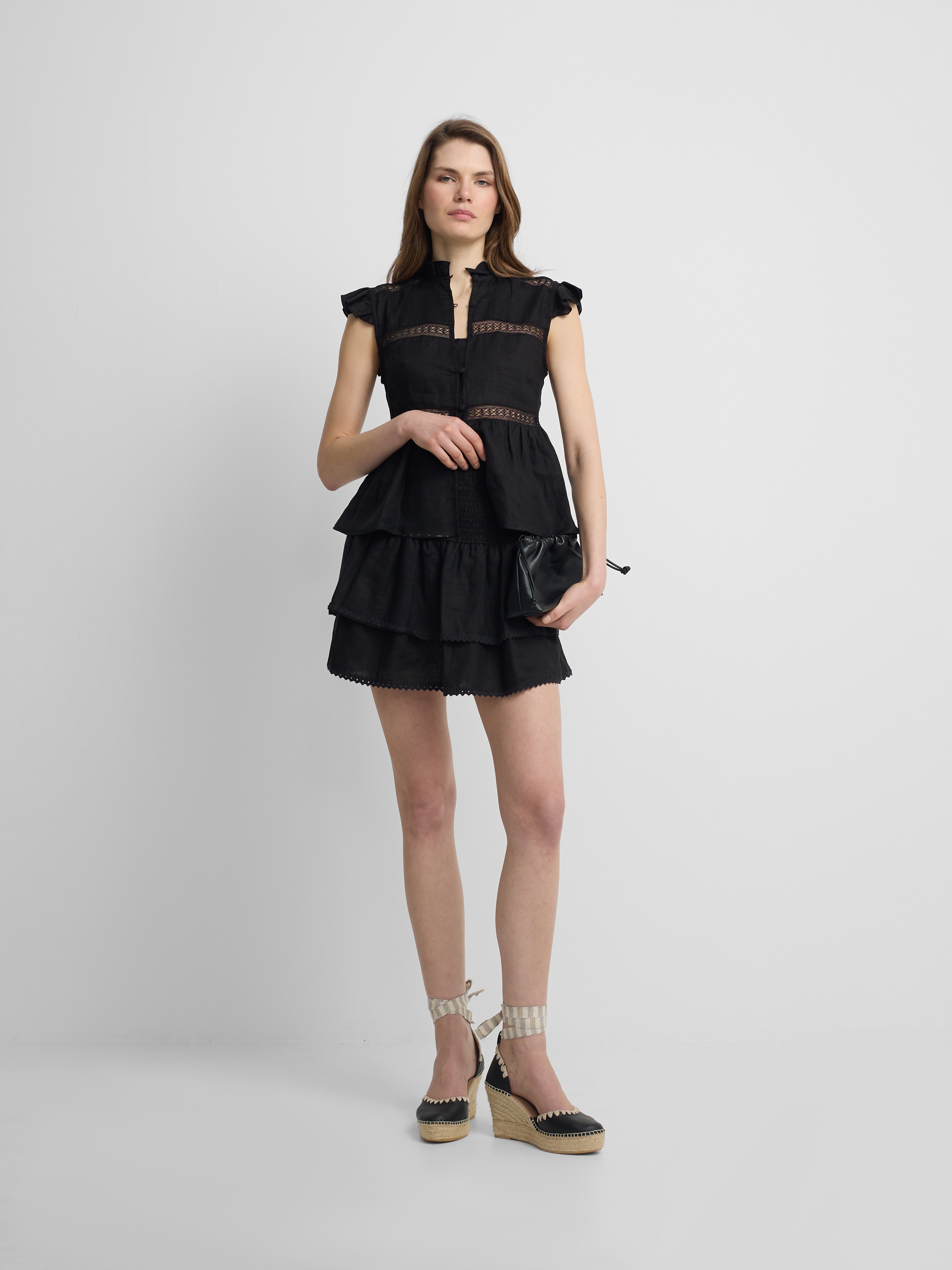 Chemisier noir avec détails brodés