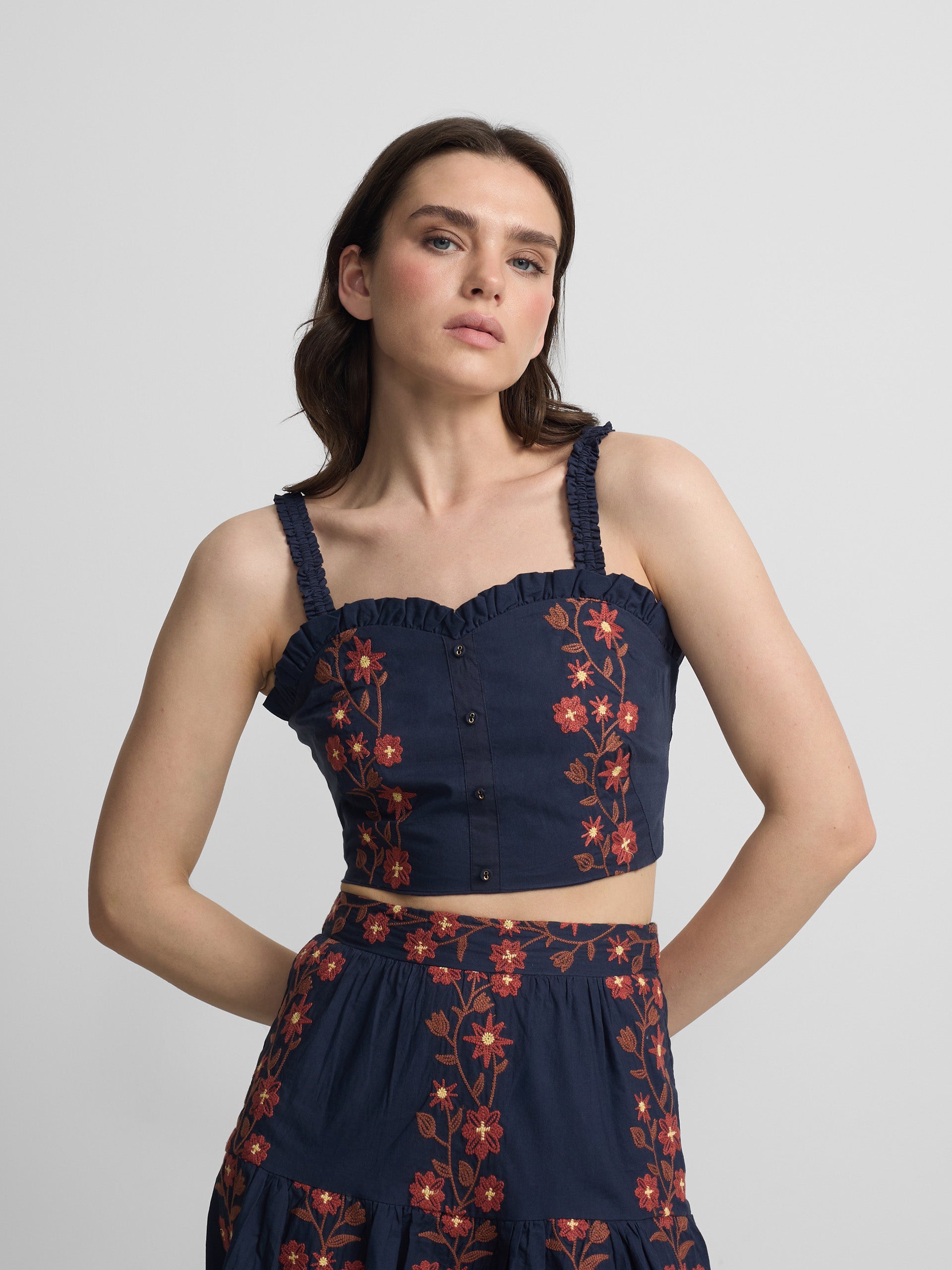 Blue embroidered flowers top