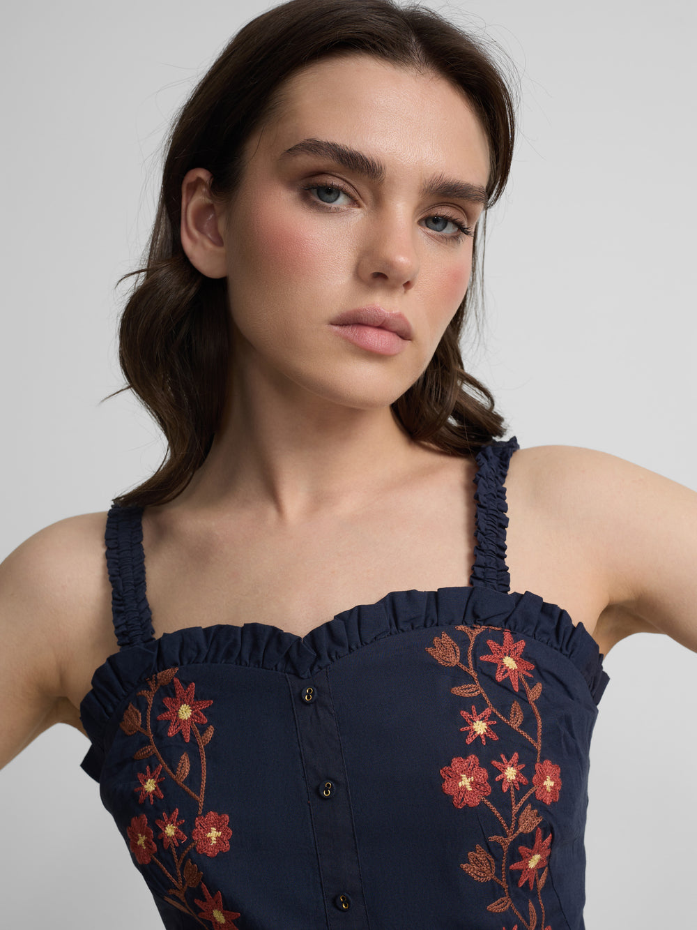 Top flores bordadas azul