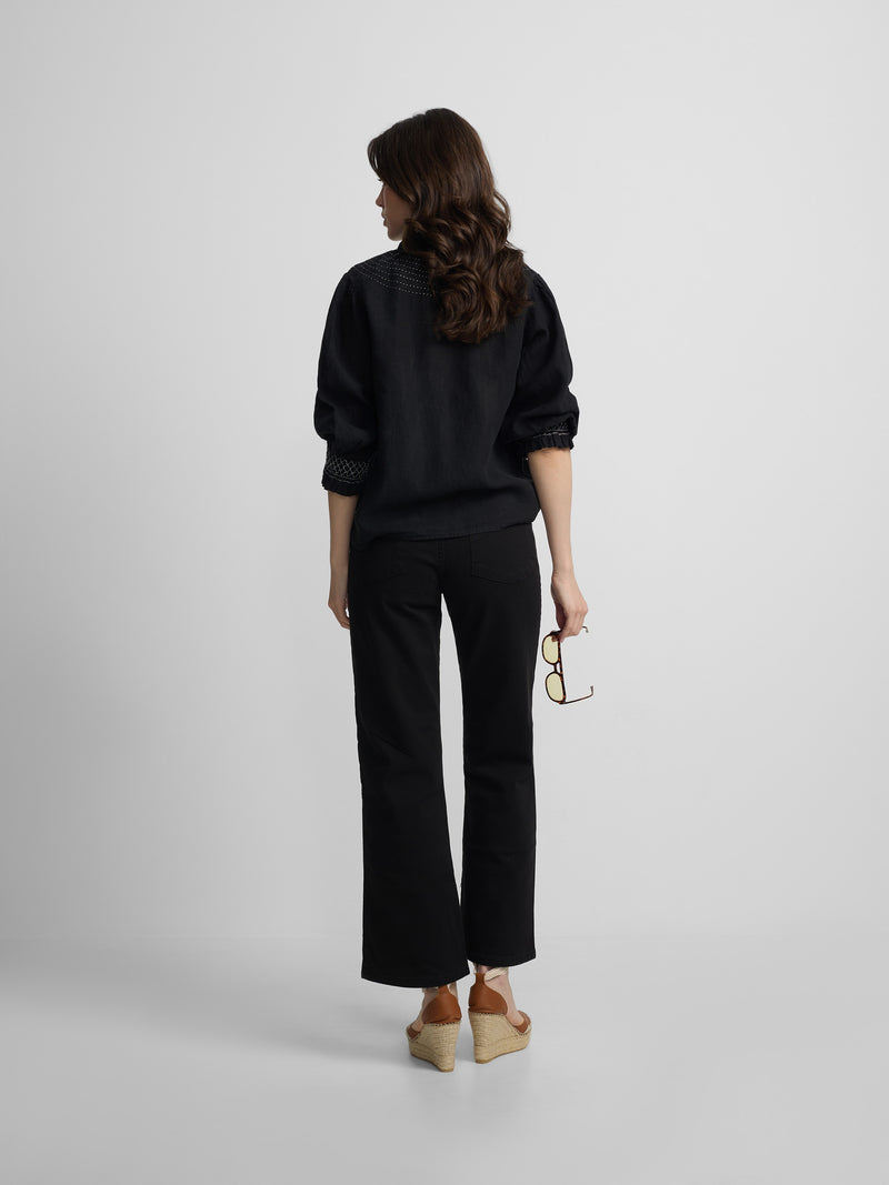 Black long-sleeved gathered linen shirt