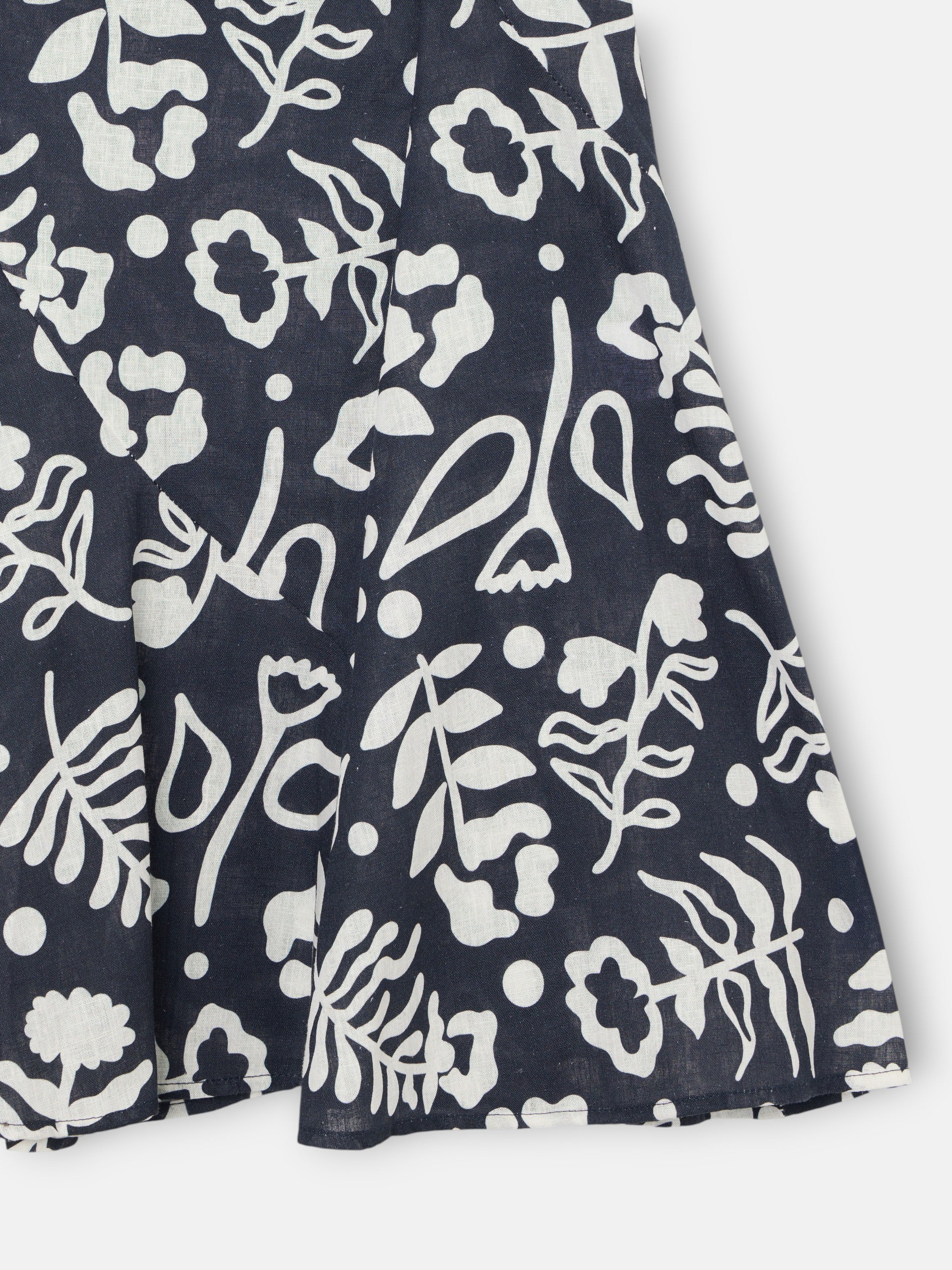 Saia fluida com folhos estampado marinho