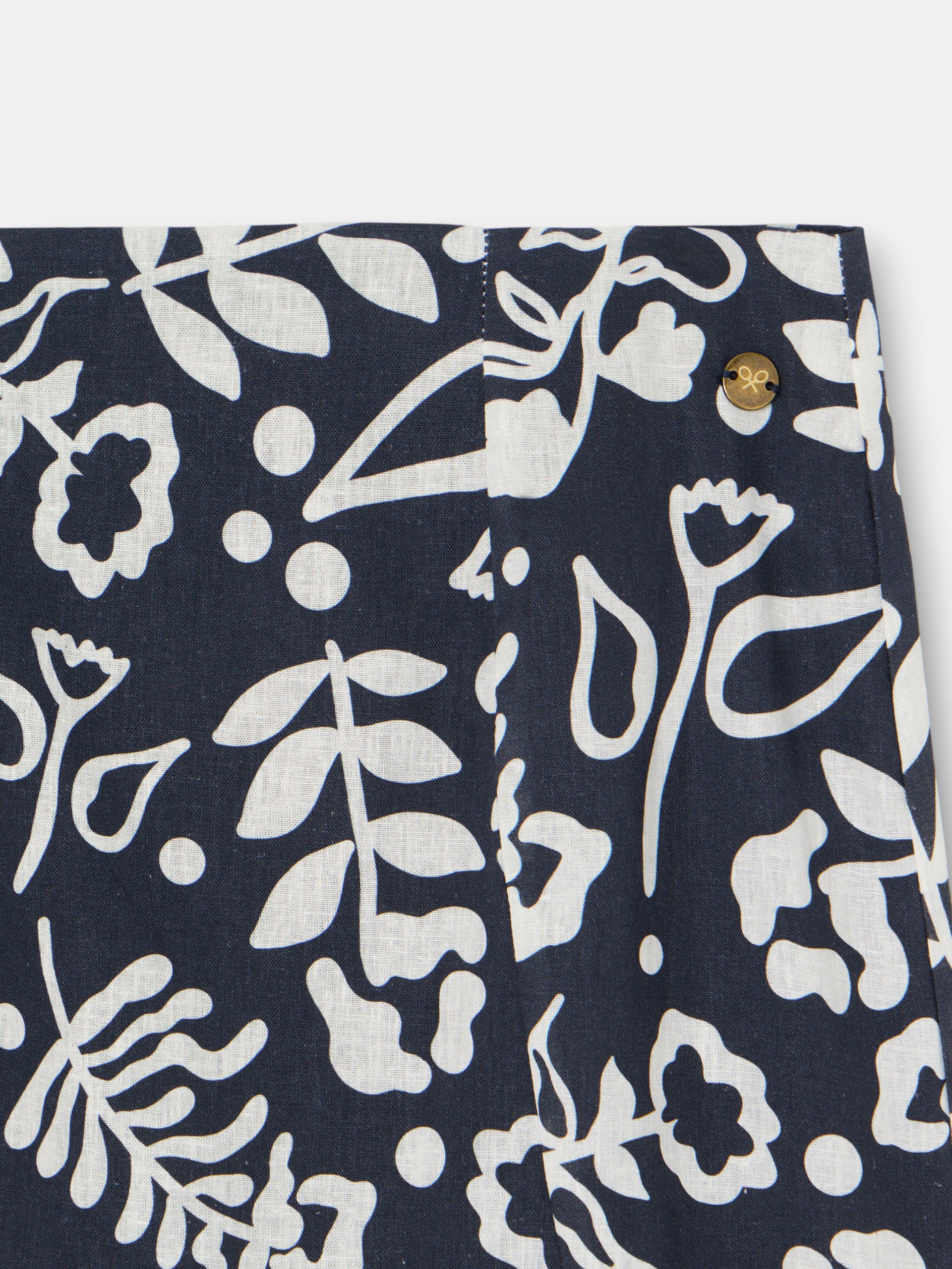 Saia fluida com folhos estampado marinho