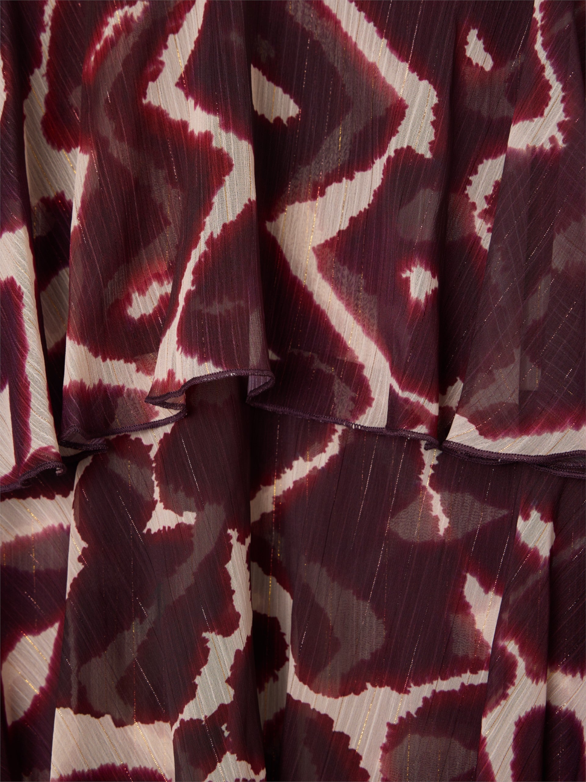 Saia comprida com folhos estampada em tons de castanho