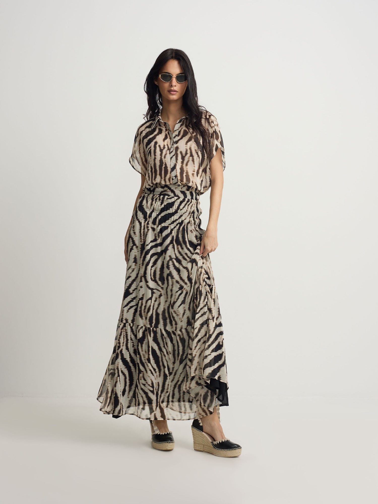 Long skirt with black animal print pattern