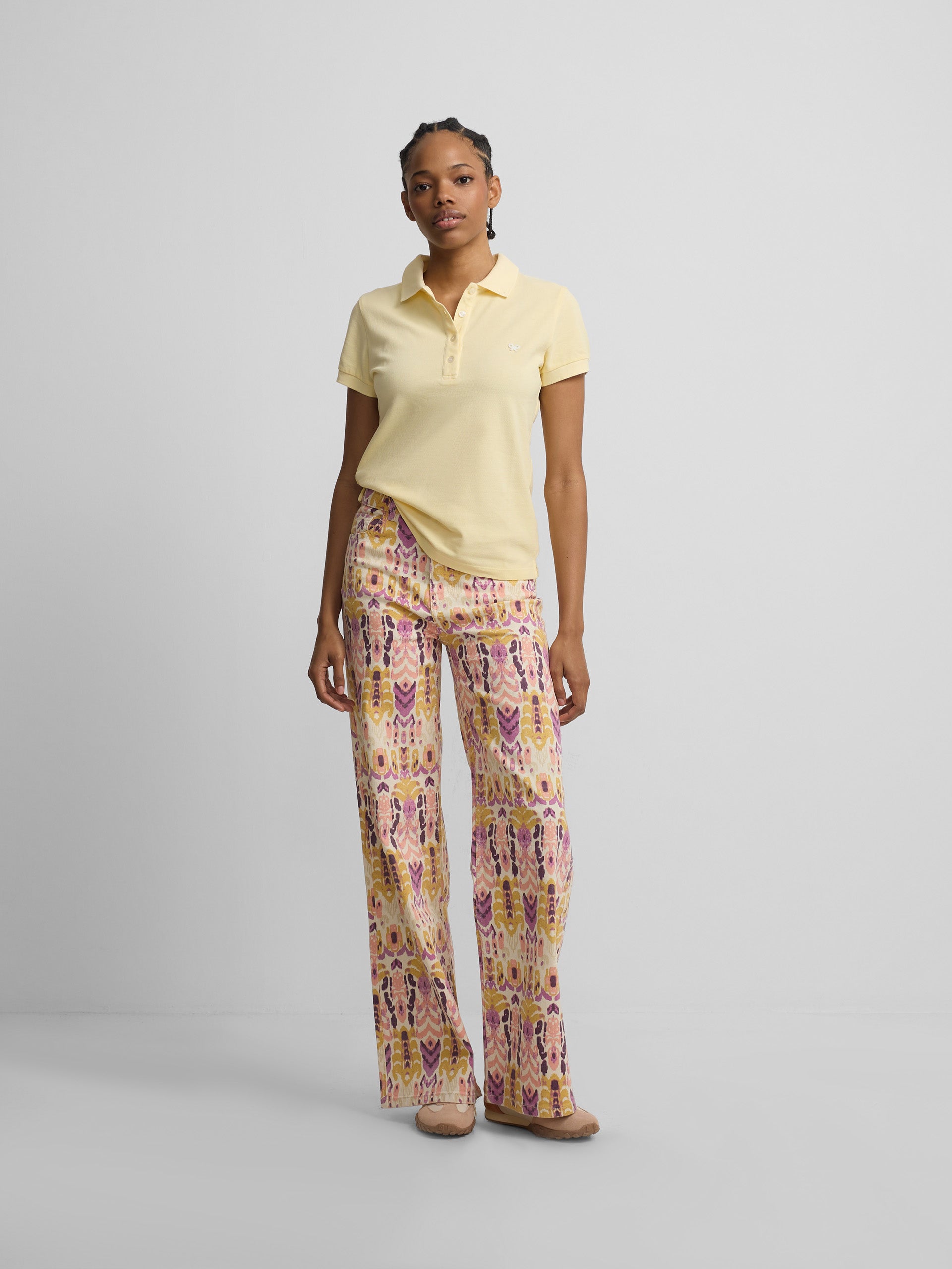 Polo clássico amarelo mulher