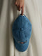 Denim cap with ethnic motif