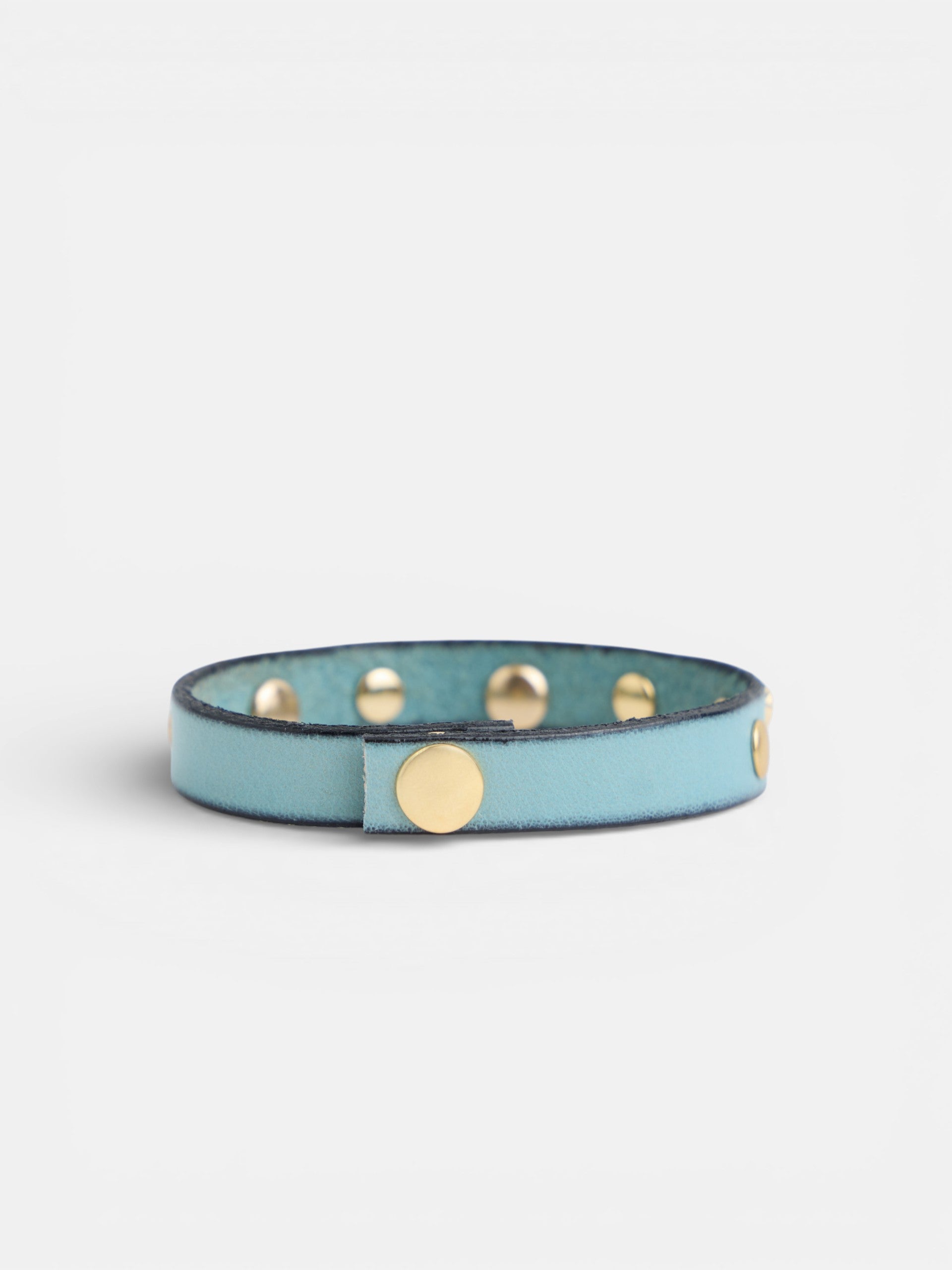 Leather bracelet with logo and aqua green studs