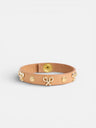 Pulseira de pele com logótipo e tachas natural