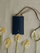 Porte-téléphone en cuir bleu marine et camel