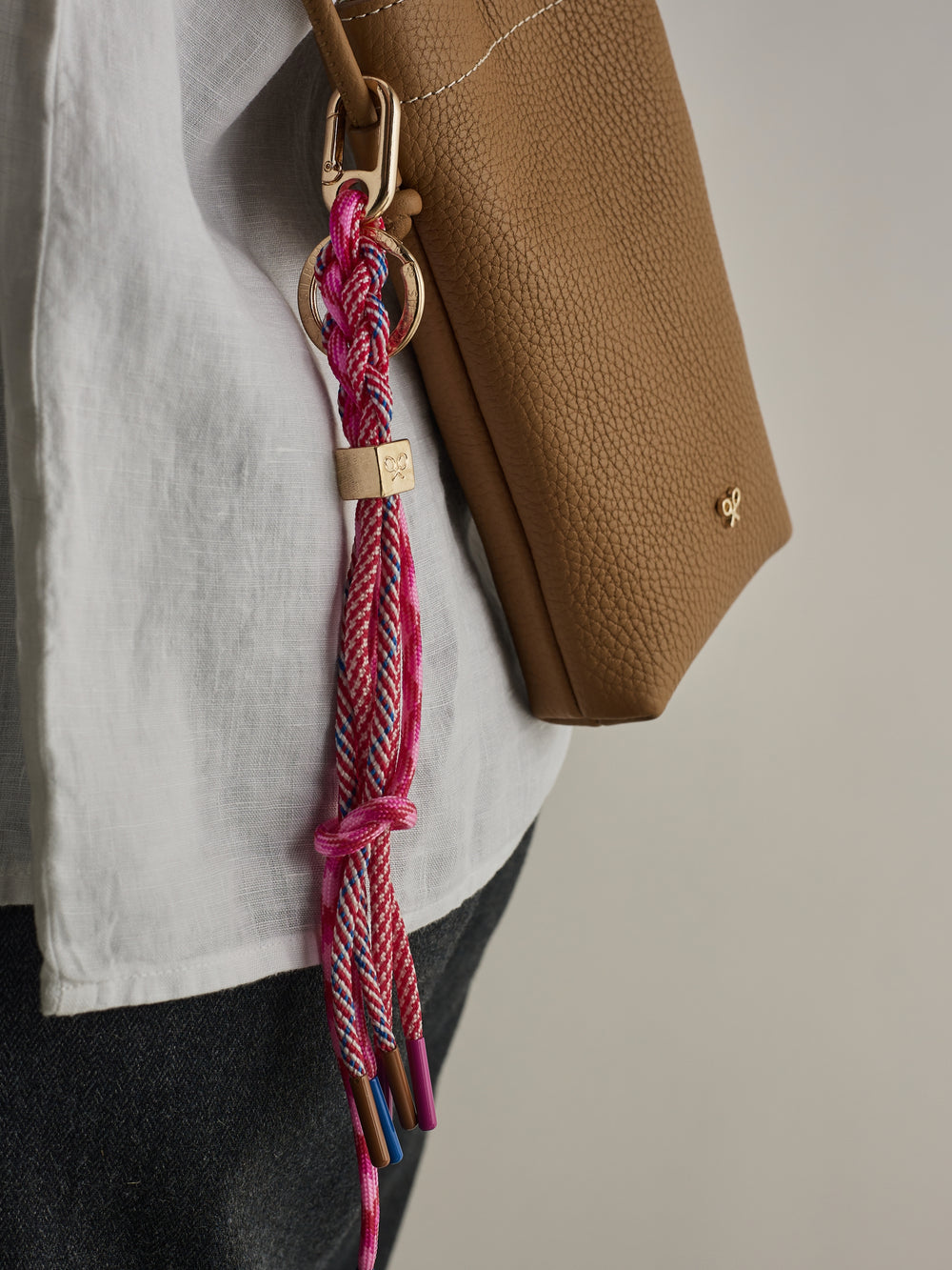 Gold and pink cord keychain