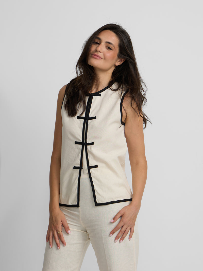 Raw linen waistcoat with contrasting trims