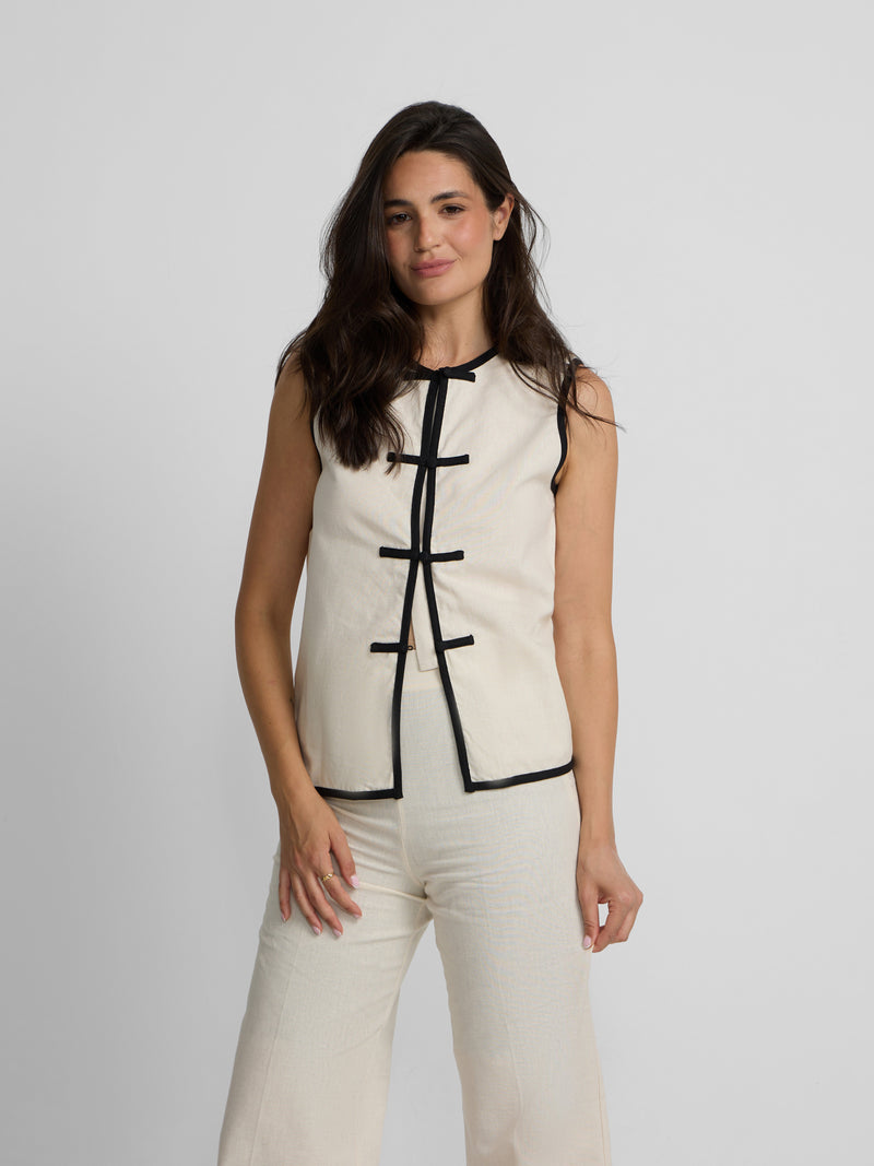 Raw linen waistcoat with contrasting trims