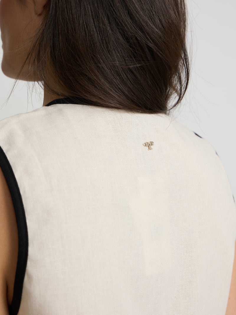 Raw linen waistcoat with contrasting trims