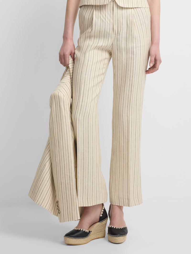 Pantalon écru à rayures bleues