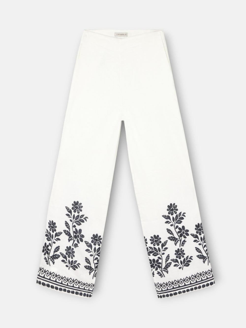 Calças estampadas com flores brancas