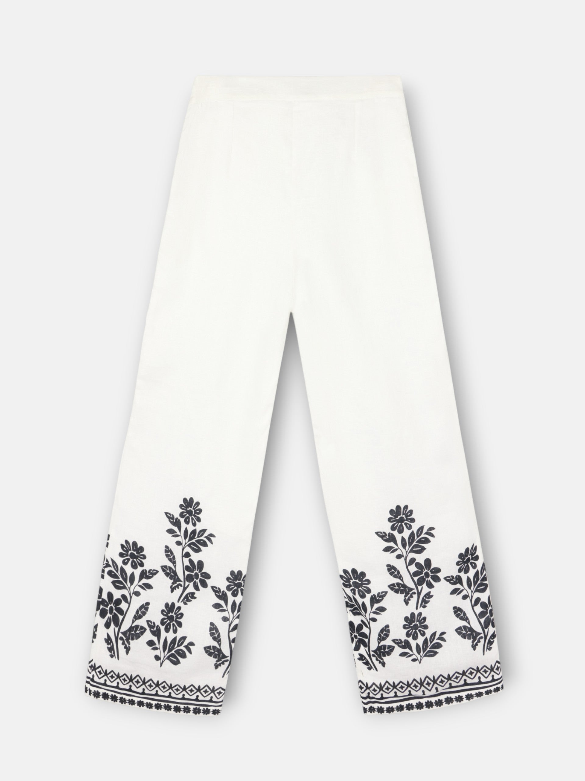 Calças estampadas com flores brancas