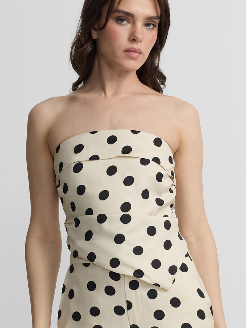 Top à encolure bardot à pois blanc et noir