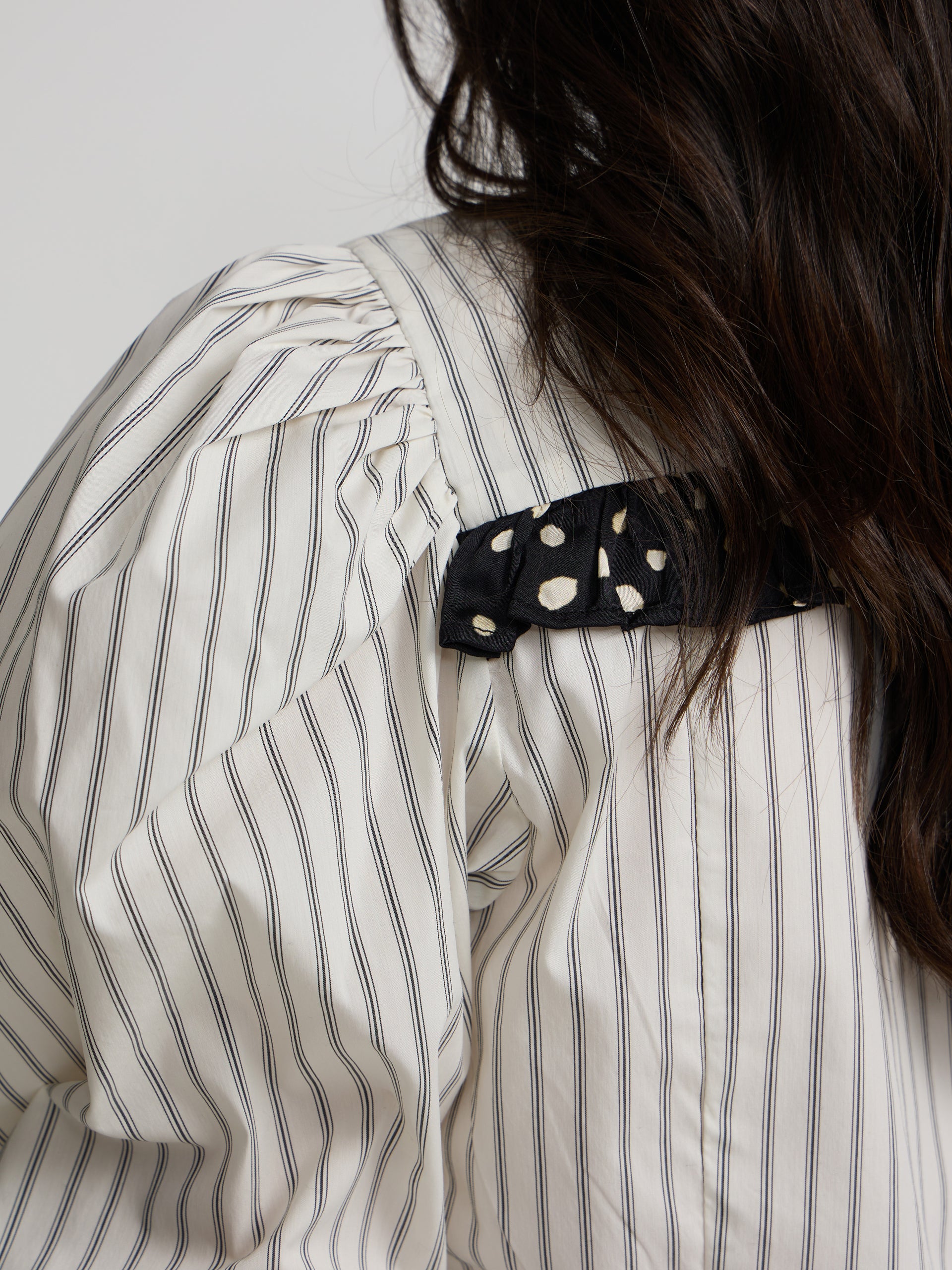 White shirt with combined stripes and polka dots print