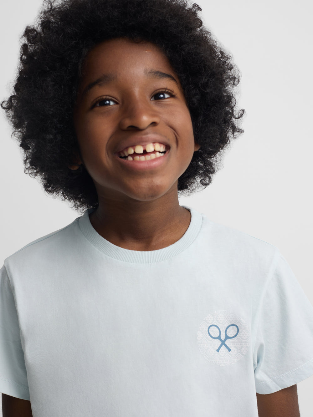 Camiseta kids raqueta etnica azul claro