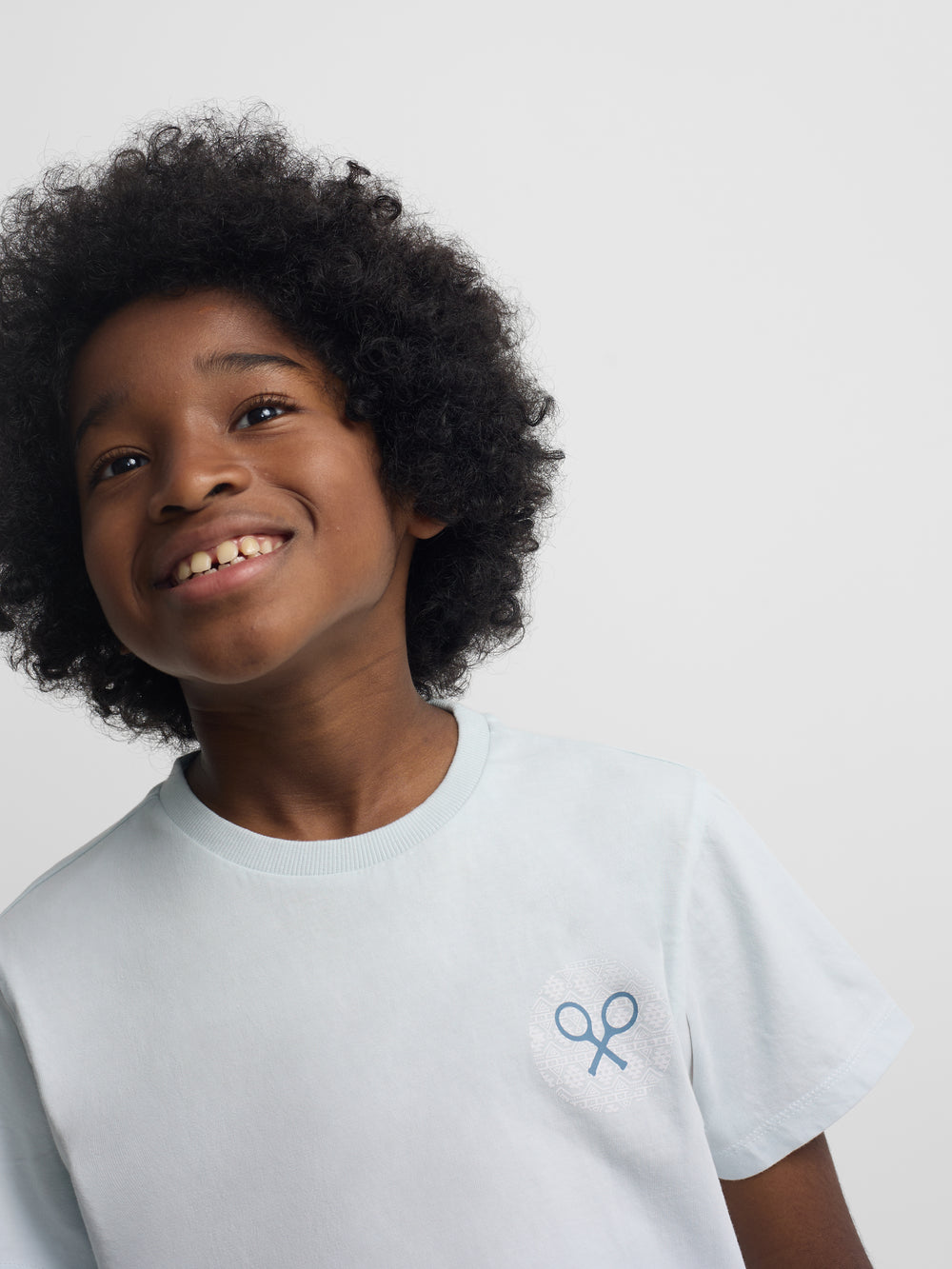 Camiseta kids raqueta etnica azul claro